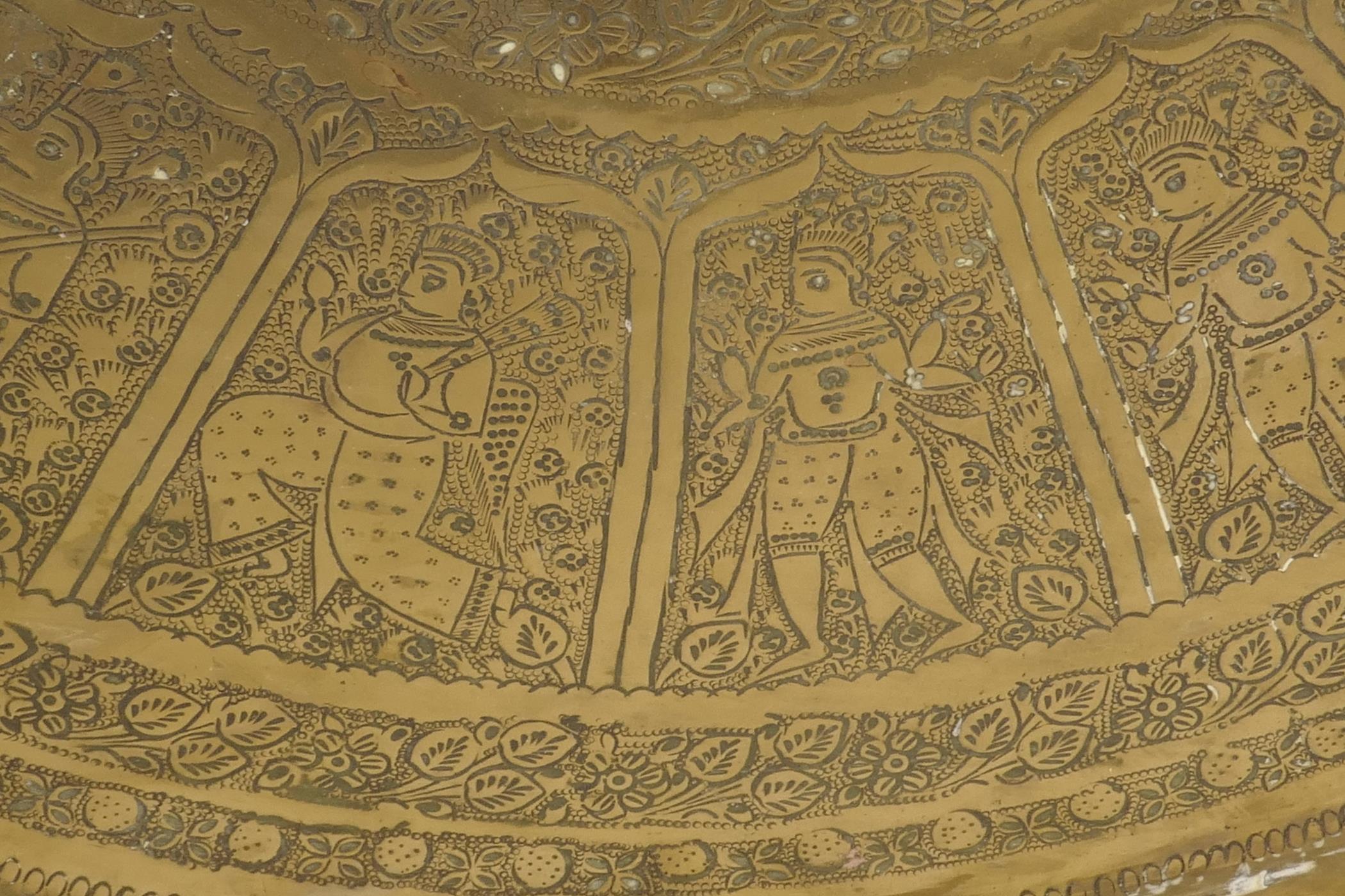 A large Indian brass tray with chased figural and animal decoration, 23" diameter - Image 2 of 6