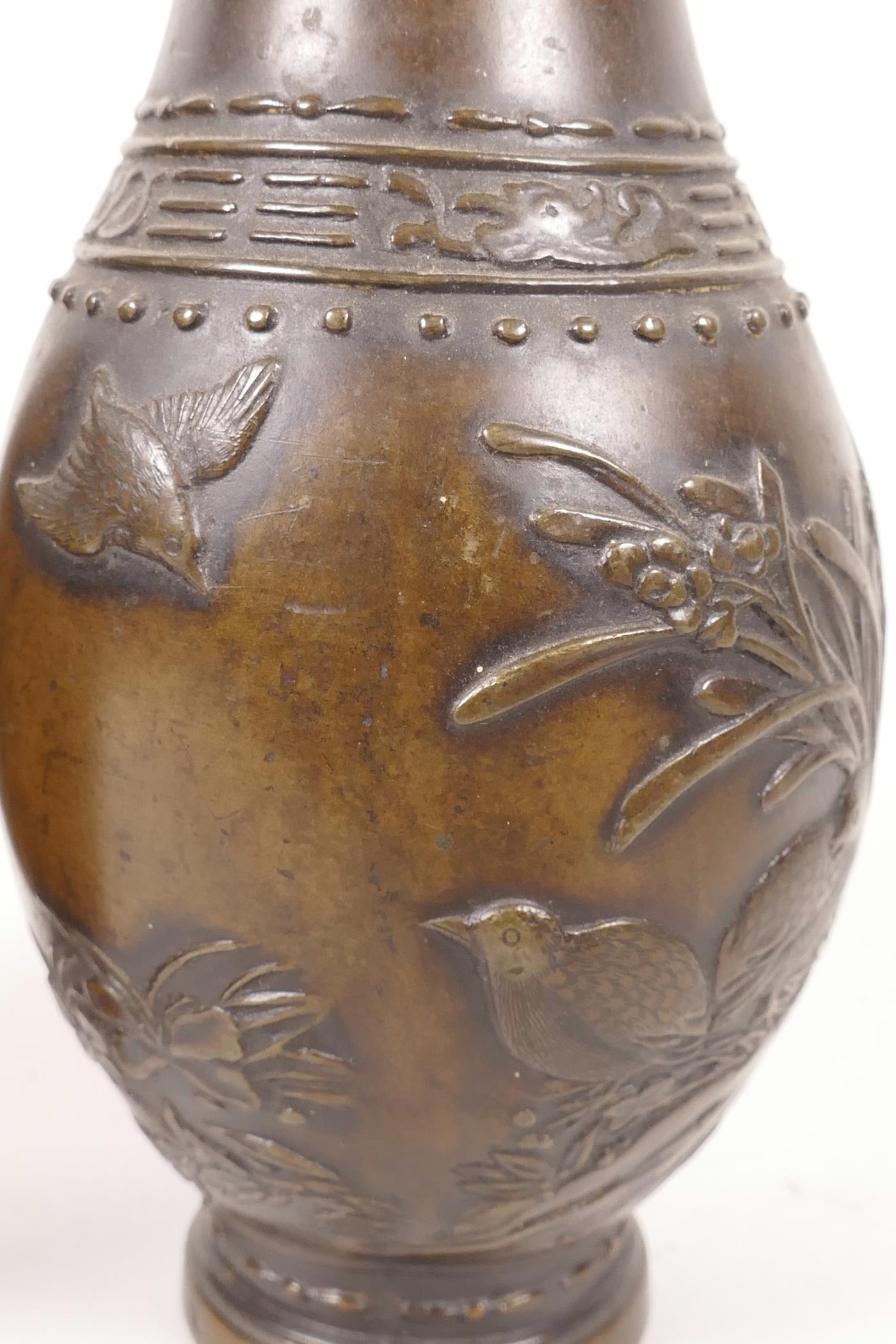 A pair of small Japanese Meiji period bronze specimen vases, the bodies with chased decoration of - Image 2 of 2