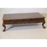 An Indian carved hardwood occasional table, with carved frieze, raised on cabriole supports with
