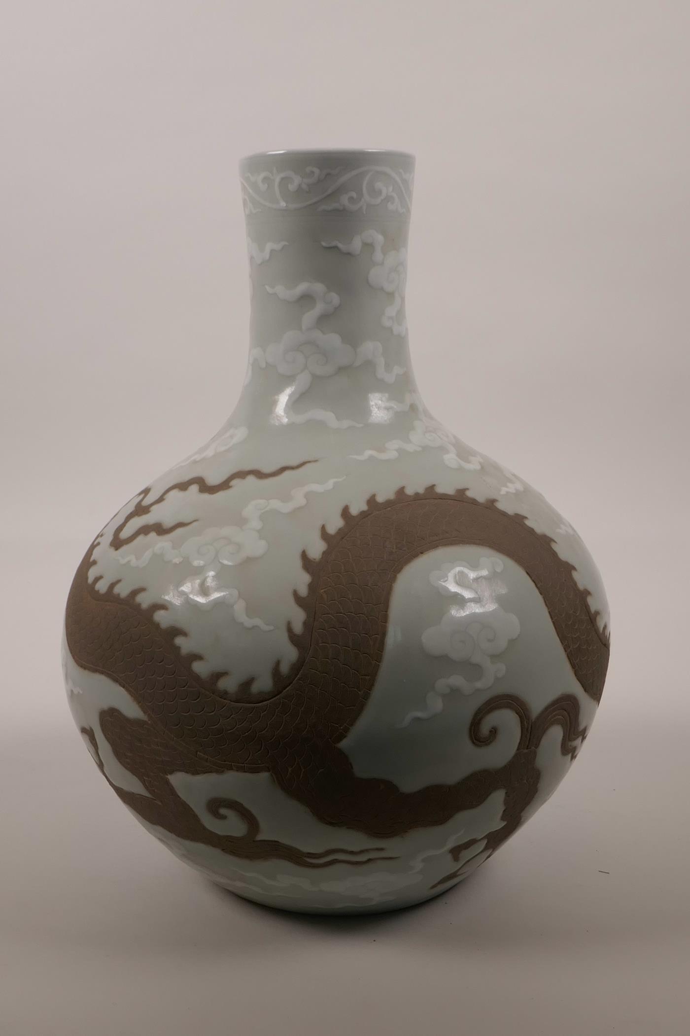 A Chinese celadon glazed pottery vase with chased dragon decoration, 6 character mark to neck, - Image 3 of 6