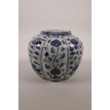 A Chinese blue and white pottery jar of lobed form with floral decoration, 4 character mark to side,