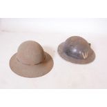 Two World War Two civilian defence helmets