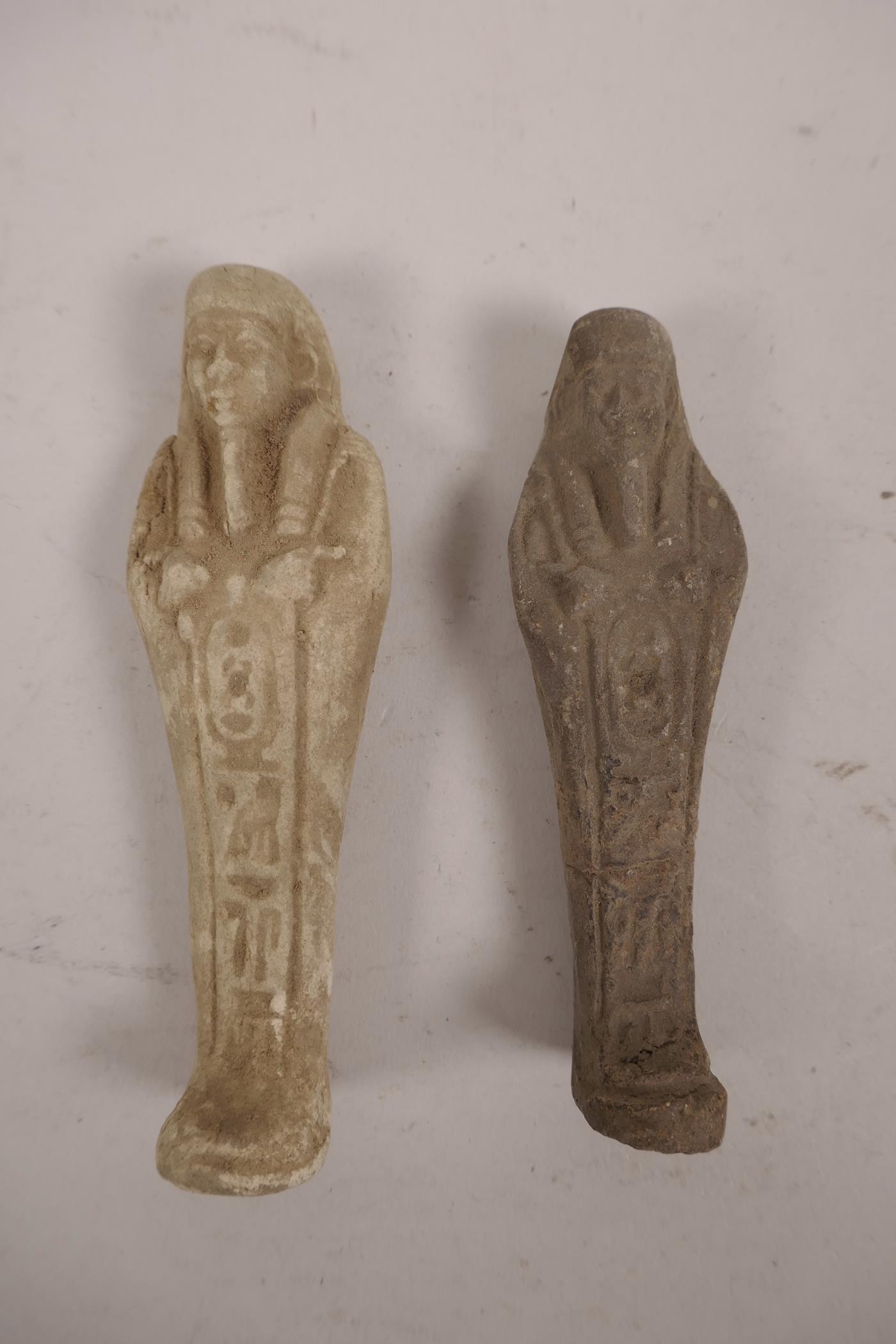 An Egyptian faience pottery shabti and another, one A/F, largest 4½"