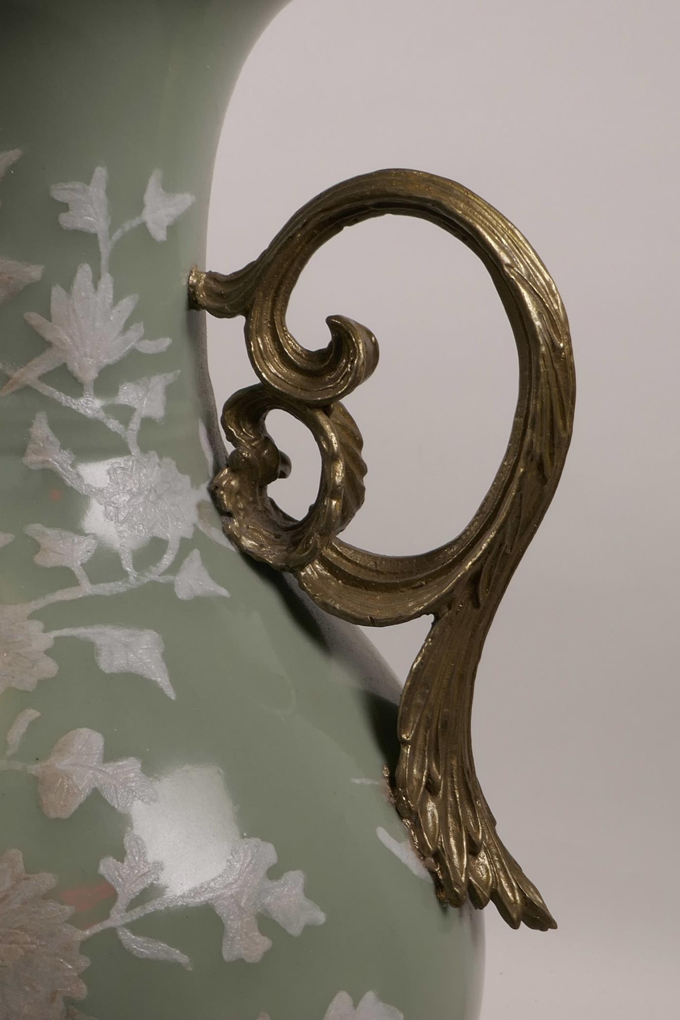 A Chinese celadon ground porcelain vase with later applied ormolu mounts and handles, and white - Image 3 of 6