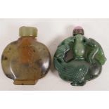 A Chinese green hardstone snuff bottle carved as a phoenix, with pink stone stopper, 2" diameter,