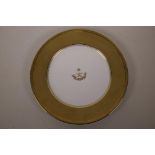 A Raynaud Limoges porcelain plate with gilt rim and bearing the Royal Crest of Sultan bin
