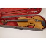 A violin with two bows in wooden case, 23½" long