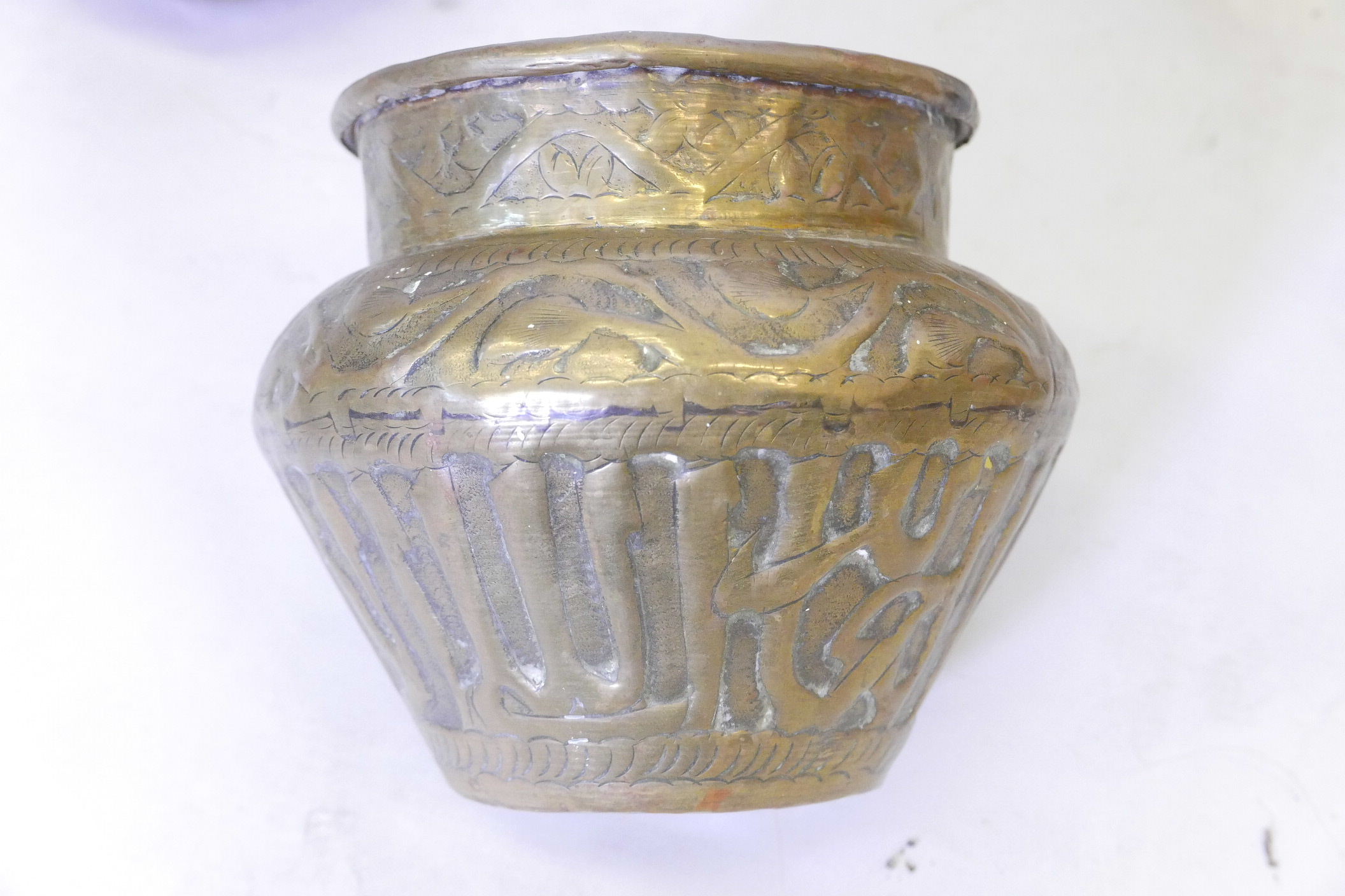 Middle Eastern Samavour A Middle eastern brass samovar, engraved with Arabic script, a heavy ...