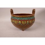 A Chinese porcelain censer with brown glaze and yellow and green enamel geometric decoration,with