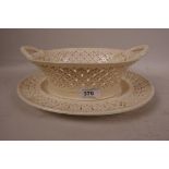 Leeds Pottery creamware, an early C19th chestnut basket and matching plate, impressed stamp on both,