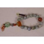 A string of antique Chinese jade prayer beads with amber, amethyst and coral embellishments, 8" long