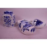 A Delft tea canister plus two Delft clogs, canister 4½" high