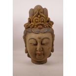 A Chinese carved and painted wood bust of Quan Yin, 15½" high