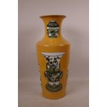 A Chinese ochre ground porcelain vase decorated with famille verte vases of assorted shapes, 6