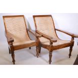 A pair of Lombok hardwood plantation chairs with rush seats, 38" long
