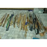 A large collection of vintage fishing rods including Strike, Milbo, Cray, Shakespeare, Alcocks,