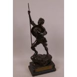 A cast metal figurine of a boy scout on wooden base bearing plaque 'The President's Trophy 1966',