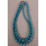 Two turquoise graduated bead necklaces, longest 23"
