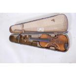 A late C19th/early C20th violin, with one piece back, in a pine case with grain painted
