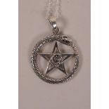 A 925 silver pendant necklace in the form of a pentagram within an ouroboros, 1" diameter