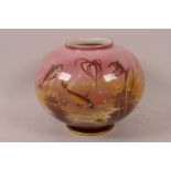 An Italian porcelain vase of squat bulbous form painted with fish on a pink ground, 5¼" high