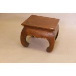 An Eastern hardwood occasional table raised on shaped supports, 20" x 20" x 16"