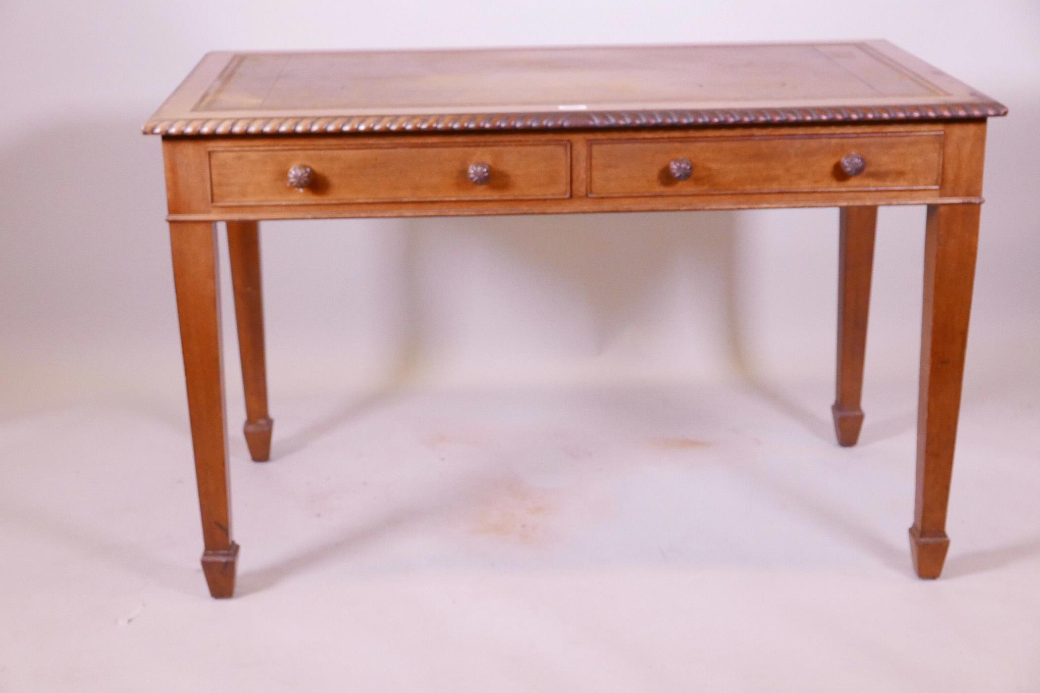 A mahogany two drawer writing table, with gadrooned edge and inset blind leather tooled top, - Image 3 of 3