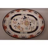 A large C19th Ashworth Ironstone Imari pattern plate, 20" x 16½"