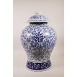 A large Chinese blue and white porcelain meiping jar and cover with all over floral decoration, 16½"