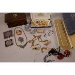 A quantity of good quality costume jewellery and a small hardwood trinket box