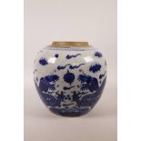 A Chinese blue and white porcelain ginger jar decorated with two dragons chasing the flaming