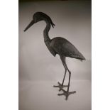 A metal garden figure of a heron, 33" high