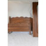 A rustic French oak double bed