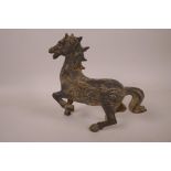 A small Chinese bronze figurine of a horse, 5¾" high