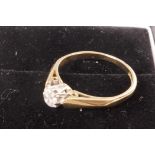 A 9ct gold and diamond solitaire ring, size 'K'