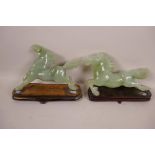 A Chinese jadeite prancing horse on wood base, and another similar, A/F, 7" long