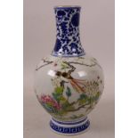 A Chinese porcelain baluster vase decorated in blue and white with flowers and key pattern, the body