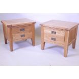 A pair of contemporary golden oak single drawer side cabinets on square tapered supports, 24½" x 27"
