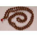 A long string of 108 Buddhist/Hindu rosary beads
