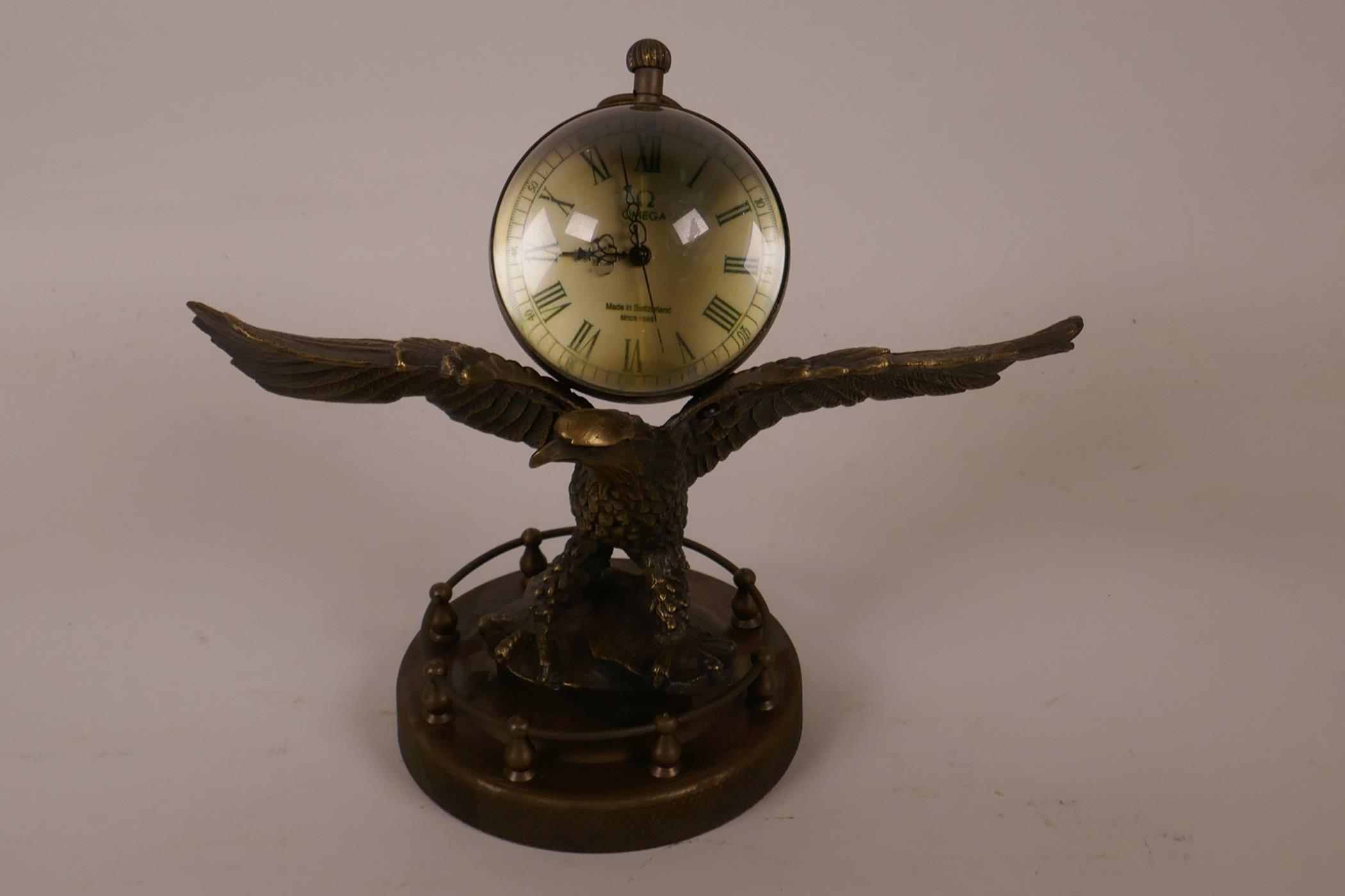 A novelty bronzed metal desk clock in the form of an American eagle with a ball clock on its - Image 3 of 3