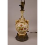 A Worcester porcelain two handled vase converted to a lamp with copper and brass mounts, 15½" high