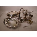 A quantity of silver plated wares including teapot, candlesticks, cream jugs etc