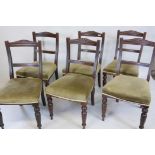 A set of three Victorian walnut dining chairs, with carved crest rails and reeded decoration, A/F