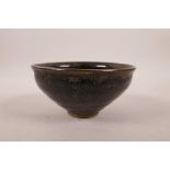A Chinese Jian kiln pottery rice bowl, 5" diameter