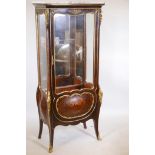 A late C19th French inlaid tulipwood vitrine with ormolu mounts, the floral inlay a lattice design