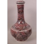 A Chinese long necked vase with red and black geometric glaze, 6 character mark to base, 12" high