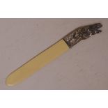 A letter opener with white metal handle in the form of a horse's head, 9½" long