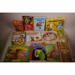 A quantity of vintage childrens' novelty and pop up books, some mint, some A/F