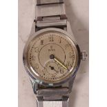 A 1940s stainless steel cased Tudor wristwatch with luminous hands, Arabic numerals and subsidiary