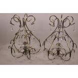 A pair of contemporary metal and glass drop chandelier light shades